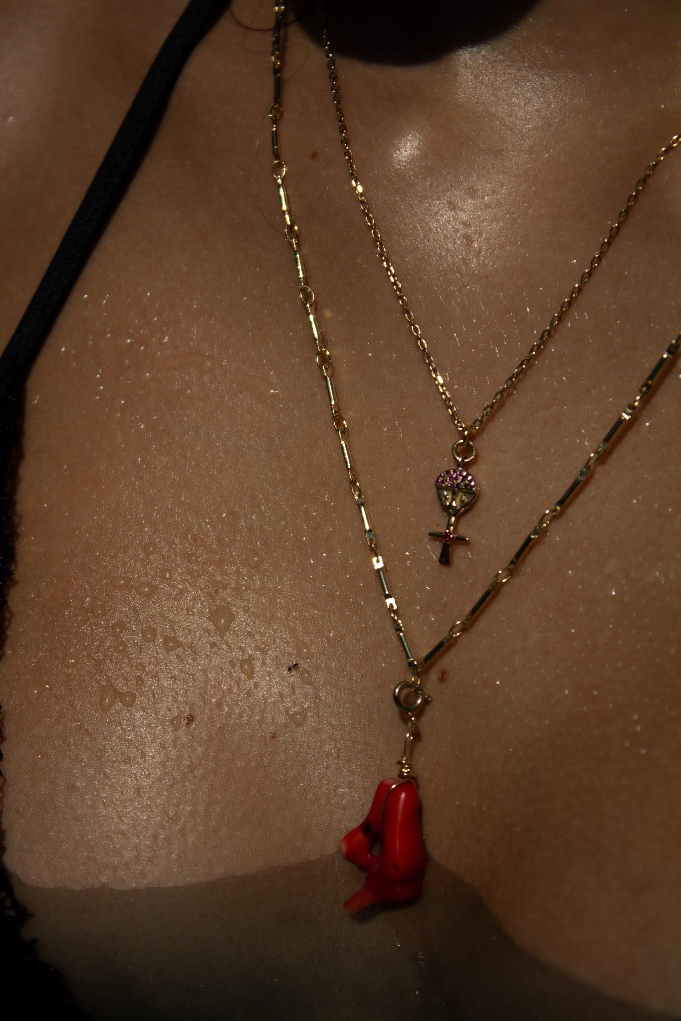 collier or poupee ashanti rubis sathyne