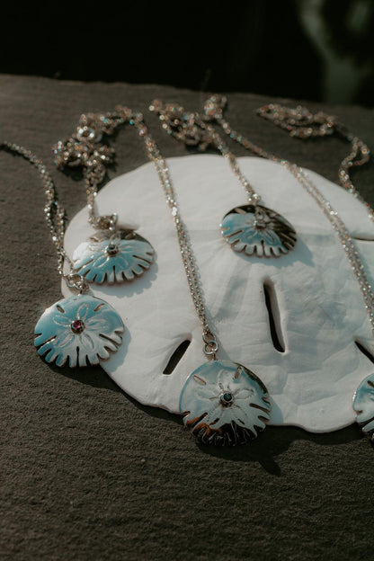 collier argent dollar des sables assinie sathyne