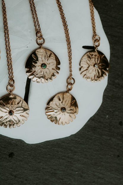 collier or dollar des sables assinie sathyne