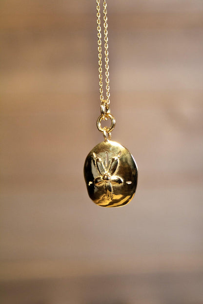 collier or dollar des sables sathyne